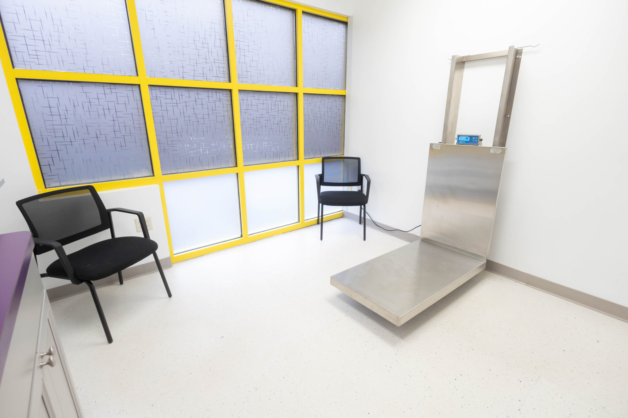 Two chairs and scale in Yalesville