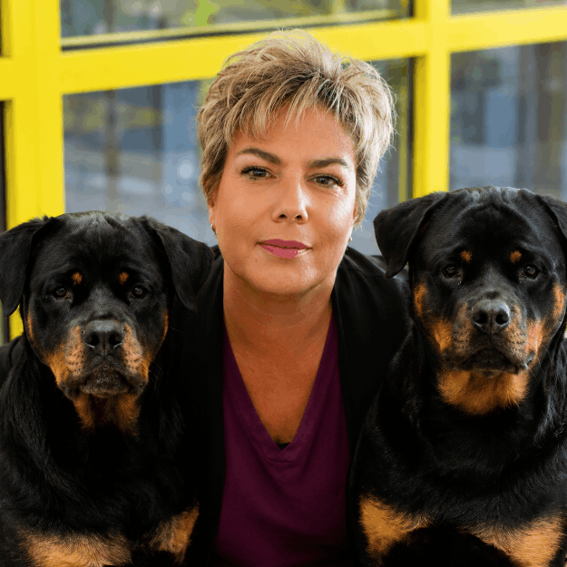 woman with two dogs